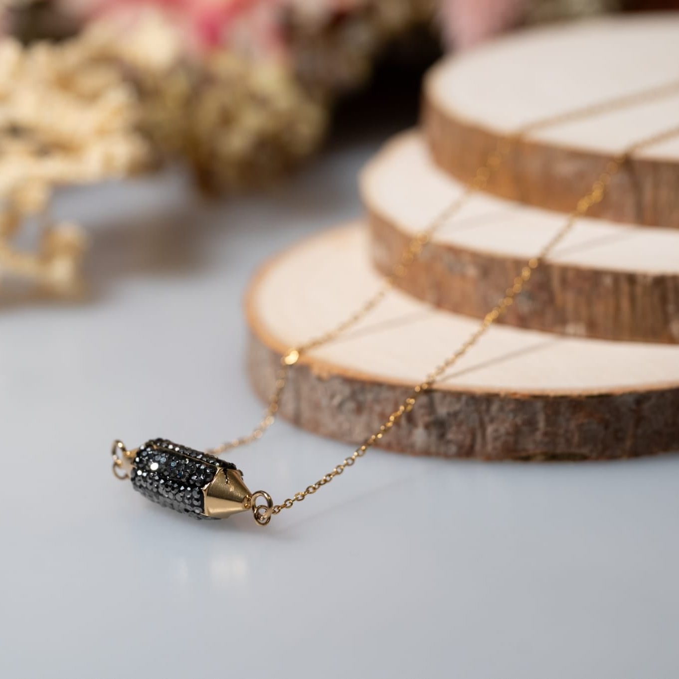 ONYXA - Collier de cylindre incrusté de pierres noires